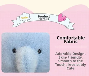 Close-up of soft blue plush fabric and cute black eye detail on elephant toy