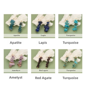 Macro view of assorted natural stone pendants with gold hooks for DIY jewelry making
