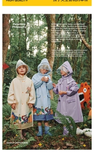 Outdoor shot of kids waterproof EVA raincoats with cartoon animal prints and hoods