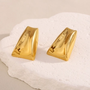 Minimalist 18K gold plated trapezoid geometric earrings on white stone display