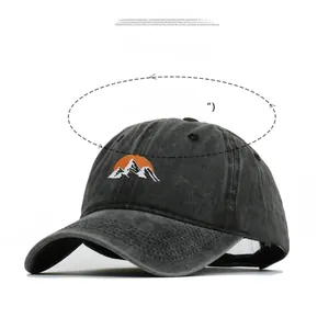 Detailed size specifications of black washed cotton baseball cap with mountain embroidery