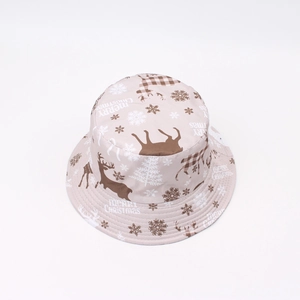 Detail of Christmas bucket hat fabric with reindeer patterns and Merry Christmas print