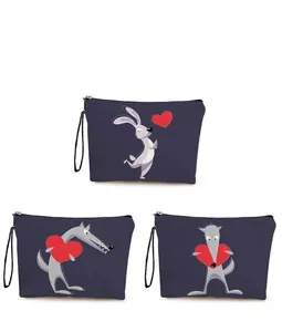Detailed pattern display of blue canvas makeup bags featuring cute rabbit and wolf prints