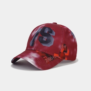 Close-up of burgundy baseball cap featuring digital industrial number 18 print details