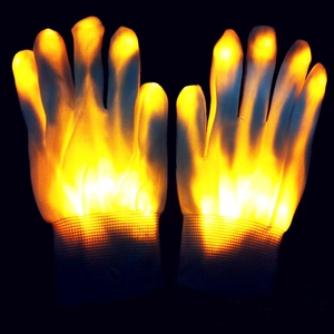 Glow-in-the-dark knitted gloves with vibrant orange LED lights on fingers and palm