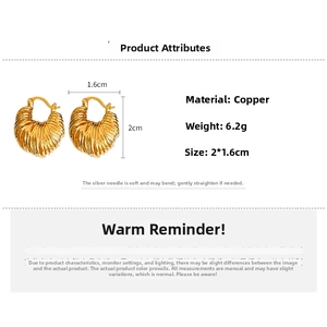 Detail view of gold U-shaped earrings with size specs and 925 silver needle material