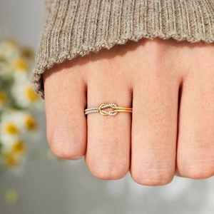 Minimalist S925 sterling silver two-tone knot ring for women on model hand