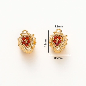 Detail view of 18k gold plated strawberry pendant with red zircon stones and 12mm height