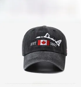 Detailed front view of gray washed denim baseball cap with Canada maple leaf embroidery