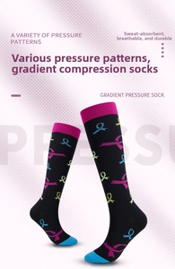 Close-up of gradient compression socks with colorful ribbon patterns and breathable texture