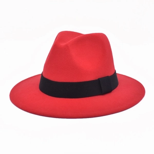 Detailed view of red wool felt fedora hat featuring a classic black grosgrain ribbon band