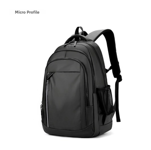 Detail of waterproof laptop backpack showing durable metal zippers and mesh side pockets