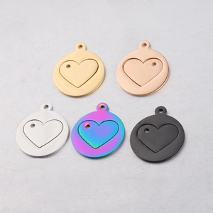 Detail of five hollow heart pendants in gold, rose gold, silver, rainbow and black finishes