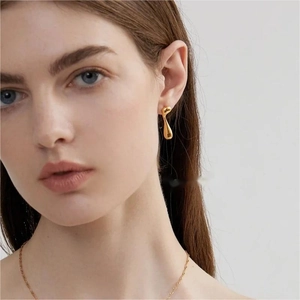 Minimalist 18K gold molten lava drop earrings in polished stainless steel for women