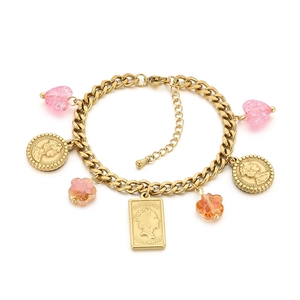 Gold stainless steel bracelet featuring embossed portrait charms and pink heart crystal beads