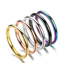 Detailed set of five polished stainless steel bands in gold silver rose gold black and rainbow