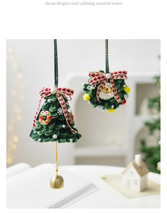 Green velvet Christmas tree and wreath with red heart ribbon and golden bells decor