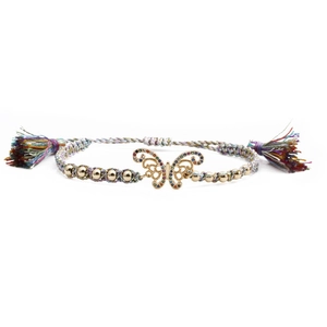Golden butterfly bracelet with colorful crystals and rainbow braided tassel rope for women