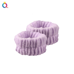 Macro detail of soft light purple coral fleece wrist spa washbands for face washing