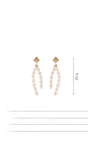 Detail view of 6.5cm Baroque freshwater pearl drop earrings in S925 sterling silver gilt