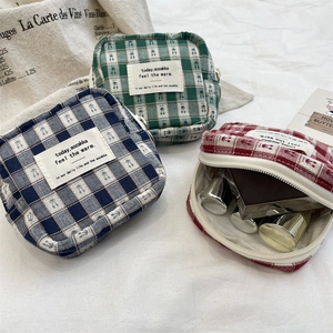 Three vintage cherry print checkered pouches showing red, green and navy blue colors
