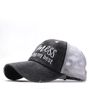 Close-up of vintage washed cotton trucker hat with mess doing my best embroidery