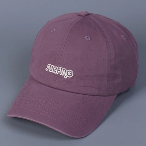 Detail view of purple washed cotton baseball cap with Surfing letter embroidery and eyelets