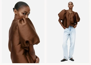 Detail of elegant brown puff sleeve blouse with glossy finish and button-down design
