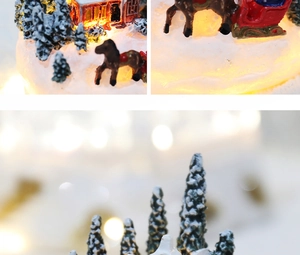 Detailed close-up of a resin Christmas scene with LED lights and festive winter carriage