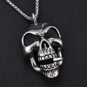 Punk style stainless steel skull pendant necklace with cigarette detail and silver chain