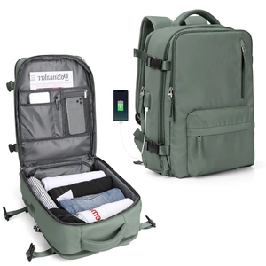 Large green travel backpack with suitcase-style opening, laptop sleeve, and USB port