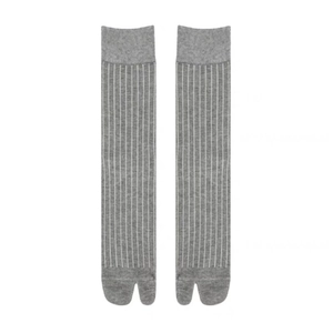 Minimalist grey tabi socks with vertical white stripes in a mid-calf cotton crew design