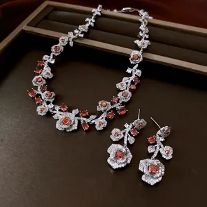 Vintage zircon rose jewelry set featuring red gemstone necklace and floral earrings