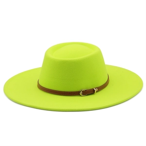 Close-up of neon yellow wool fedora featuring a brown leather belt buckle and fine felt texture