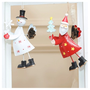 Detail of iron metal Santa and Snowman ornaments with glossy painted finish