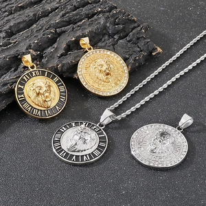 Hip hop lion head pendants with Roman numerals and crystals on charcoal rock background