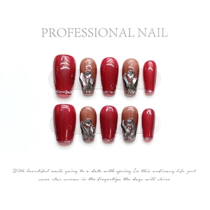 Handmade deep red and mocha press-on nails with silver glitter and rhinestone accents
