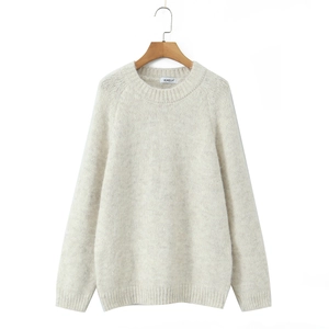 Minimalist cream white crewneck knit sweater with raglan sleeves and ribbed cuffs on hanger