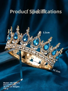 Detailed close-up of luxury bridal crown with blue teardrop crystals and gold rhinestones