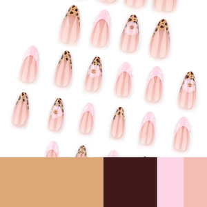 French leopard print almond press-on nails with 3D pink flowers and glitter accents