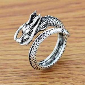 Macro shot of silver octopus dragon ring with antique finish and adjustable open band