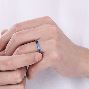Rainbow gradient 3mm stainless steel ring detail on index finger with smooth finish