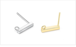 Close-up of S925 sterling silver L-shaped earring studs with rings in gold and silver