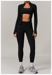 Three-piece black yoga set with jacket, sports bra, and high-waist seamless leggings
