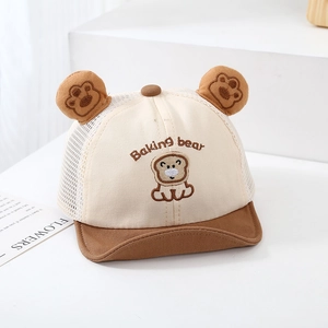 Detail of baby mesh cap showing embroidered baking bear logo and 3D bear ears