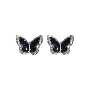 Silver needle butterfly stud earrings with black enamel and sparkling zircon accents