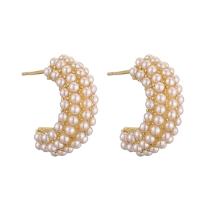 Elegant gold C-shaped hoop earrings with rows of small white pearls for a luxury style