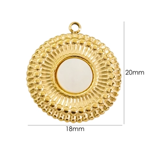 Macro shot showing 18mm by 20mm dimensions of a vintage style white shell gold pendant