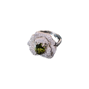 Adjustable silver flower ring featuring an oval green gemstone and zircon accents