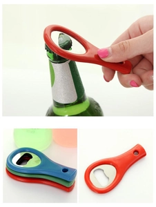 Three-color portable bottle opener with stainless steel insert and ergonomic grip handle
